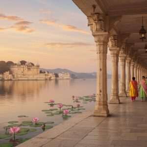 A serene, picturesque depiction of Udaipur's rich heritage and spiritual ambiance. The scene showcases the iconic City Palace and the tranquil waters of Lake Pichola reflecting the warm, golden glow of a setting sun. In the foreground, a group of Indian tourists dressed in elegant, modern ethnic wear are seen walking along a beautifully preserved cobblestone path lined with intricately carved stone pillars and blooming lotus flowers. The sky is painted in soft pastel hues with hints of saffron and maroon, evoking a sense of peace and mindfulness. The art style combines traditional Indian elements with a modern digital aesthetic, featuring intricate patterns and cultural motifs subtly integrated into the architecture and landscape. The overall composition exudes a harmonious blend of history and spirituality, inviting the viewer to explore Udaipur's legacy and its preservation efforts.